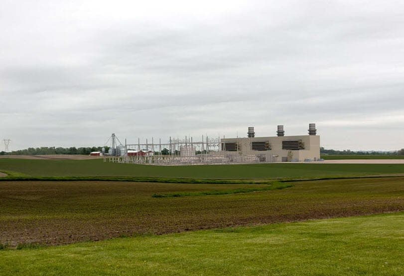 Rendering of Alliant Energy's proposed Morgan Valley Energy Center gas plant beside farm fields in Linn County, Iowa
