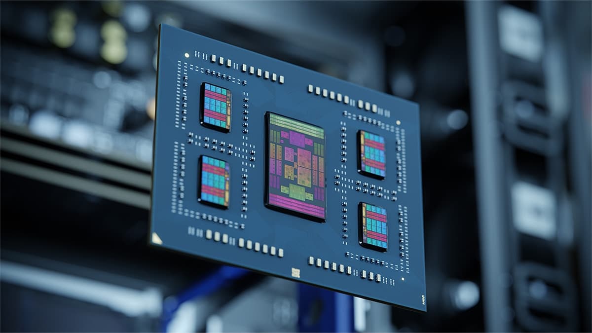 AMD EPYC server processor package with its chiplets visible, in front of server racks